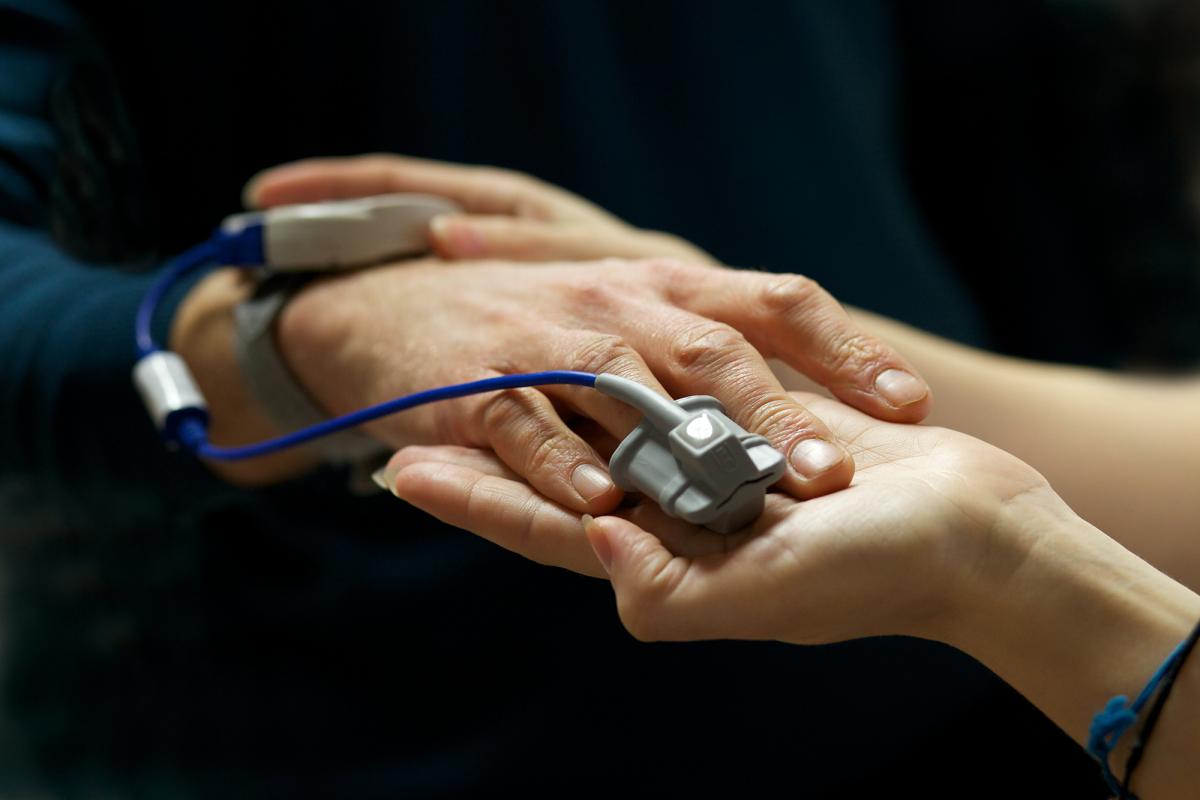 Oxygen saturation monitor with finger clip (the patient is breathing