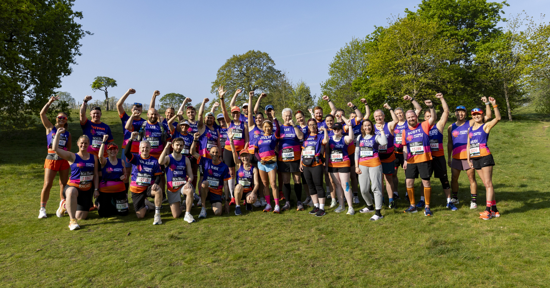 Group of Team Breathe runners cheering