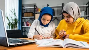 Teacher and child at school