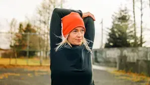 Woman stretching outdoors