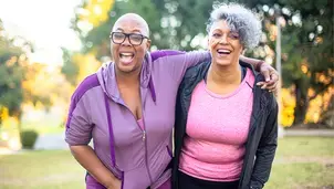 Two women walking in a park