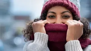 Woman wearing a hat and scarf