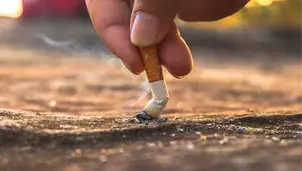 Stubbing out a cigarette