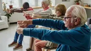 People doing chair based exercise