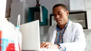 Researcher using a laptop