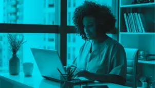 Woman looking at a laptop