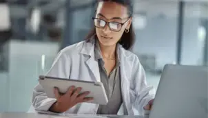 Researcher using a tablet