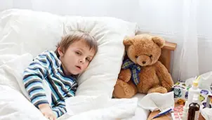 Child ill in bed