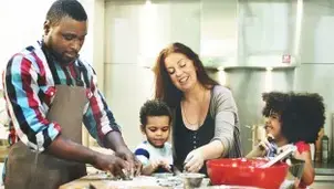 Family cooking food in the kitchen