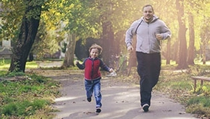 Man and son racing