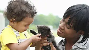 Mum and son with a kitten