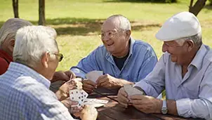 A group of friends playing cards