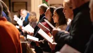People in church singing together
