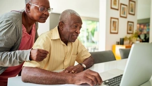 couple looking at laptop