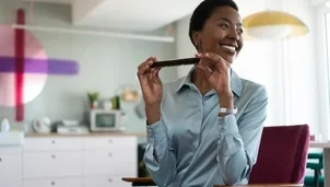 woman playing harmonica