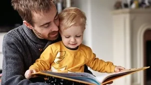 Person reading to a child