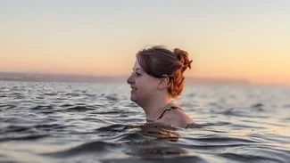 Woman swimming at the sea